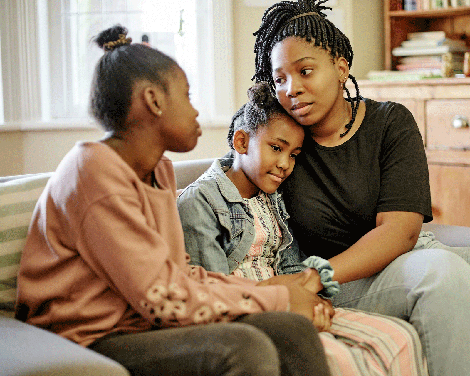 A parent and their two children